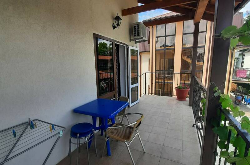 Улучшенная четырехместная комната с балконом