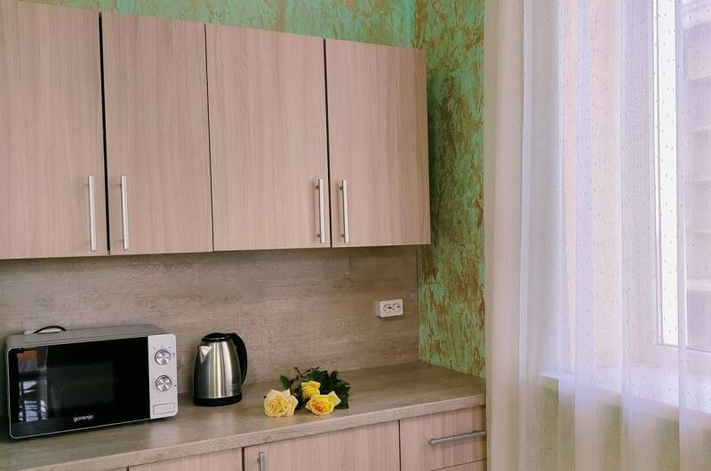 Семиместный номер-студия с мини-кухней