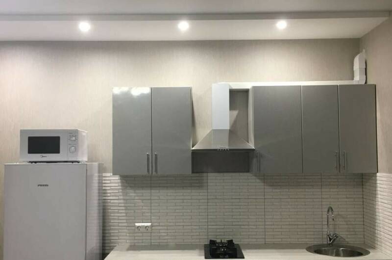 Студия с балконом и двухспальной кроватью