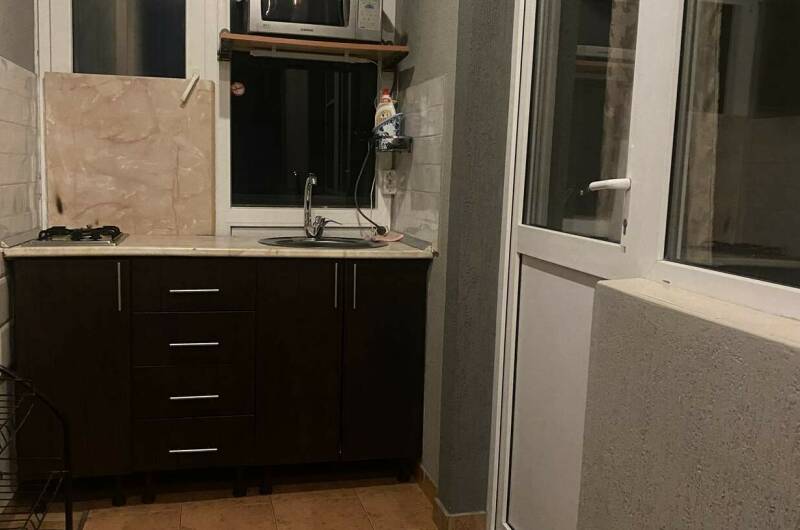 Трехместный номер с кухней на балконе