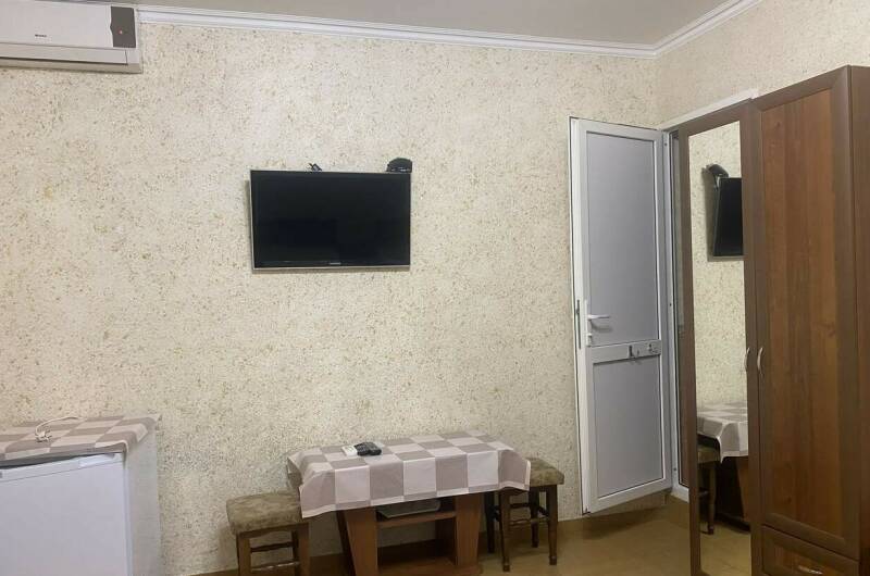 Трехместный номер с кухней на балконе