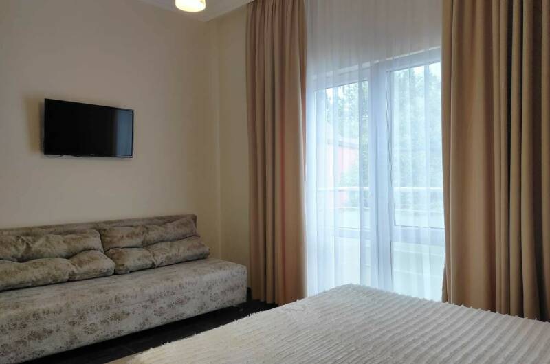 Комната на 2−4 человека с балконом