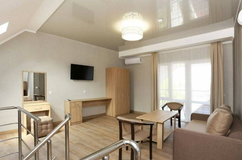 Двухуровневый номер с кухней