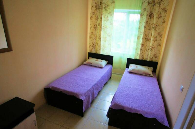 Двухкомнатный номер в коттедже (4−5 чел)