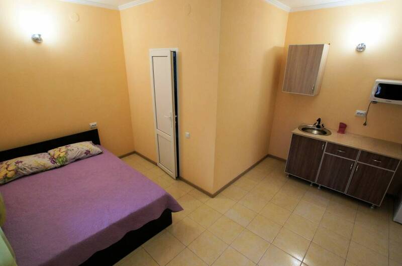 Двухкомнатный номер в коттедже (4−5 чел)