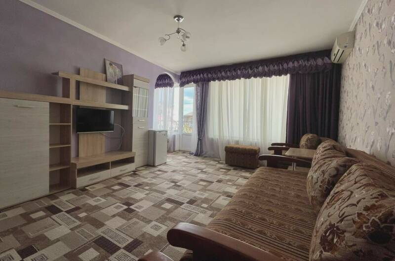 Номер семейного типа с видом на горы и море