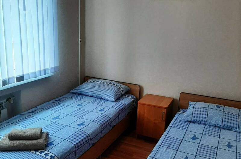 Комната с отдельными кроватями