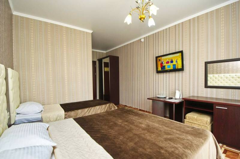 Трехместный номер с балконом