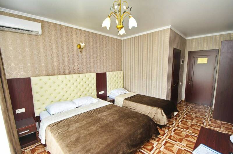 Трехместный номер с балконом