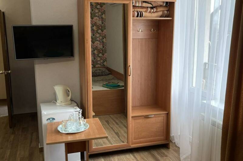 Трехместный номер с балконом