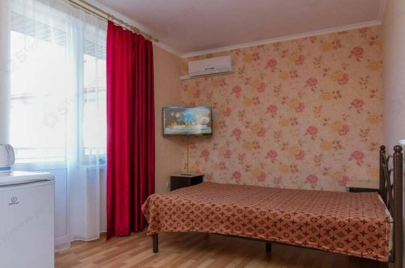 Четырехместный номер с удобствами и балконом