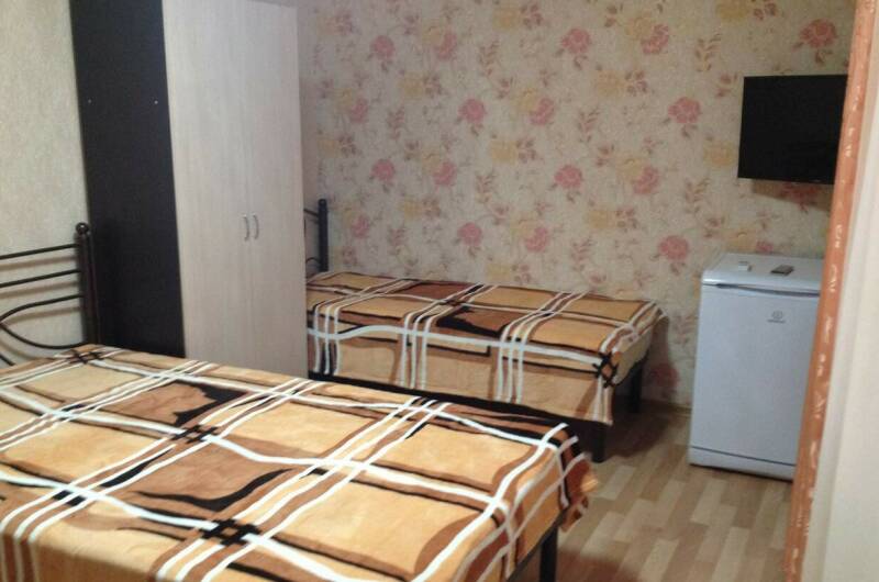 Четырехместный номер с удобствами и балконом