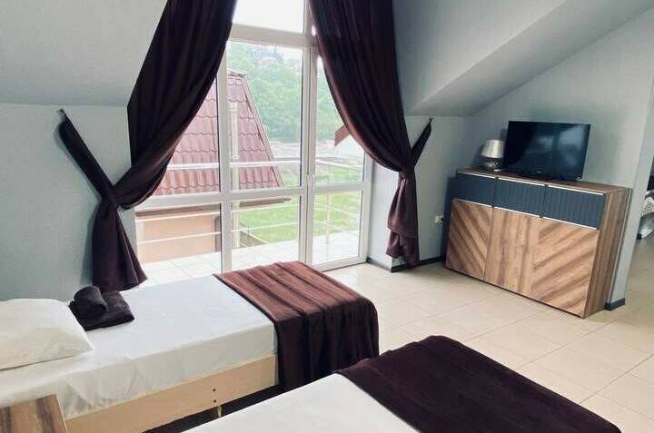 Апартаменты с 2 спальнями и террасой (45 квм)