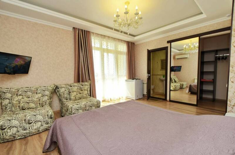 Четырёхместный «Стандарт» с балконом (3 этаж)