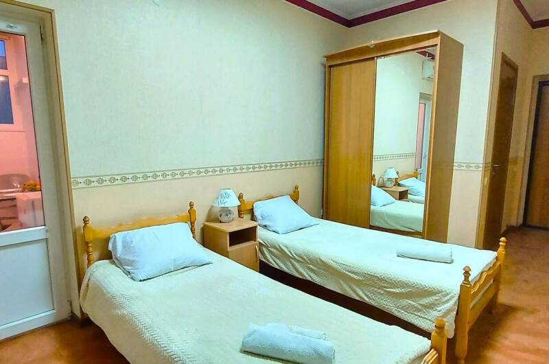 Двухместный с балконом двумя отдельными кроватями