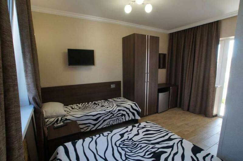 Трёхместный стандарт с балконом