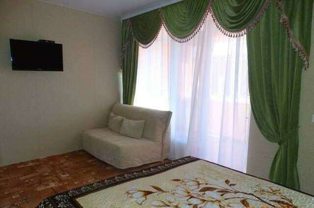 Комната с удобствами на 2−4 человека с кухней