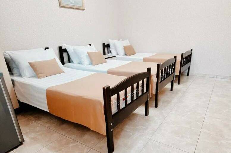 Трёхместный три раздельные односпальные кровати