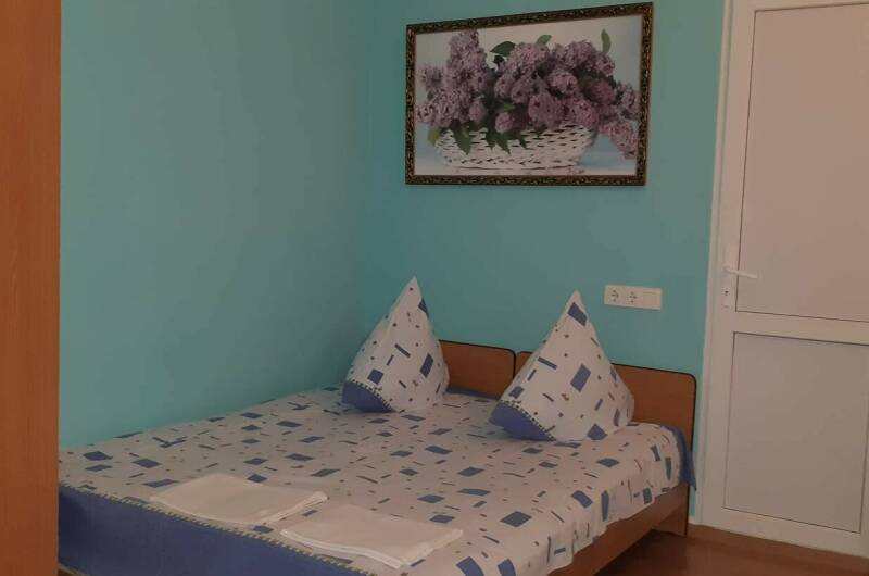 Стандартный трехместный номер с балконом