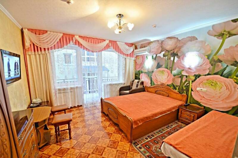 Трехместная комната с балконом