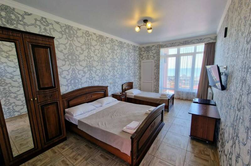 Трёхместный «Делюкс» с балконом и видом на море