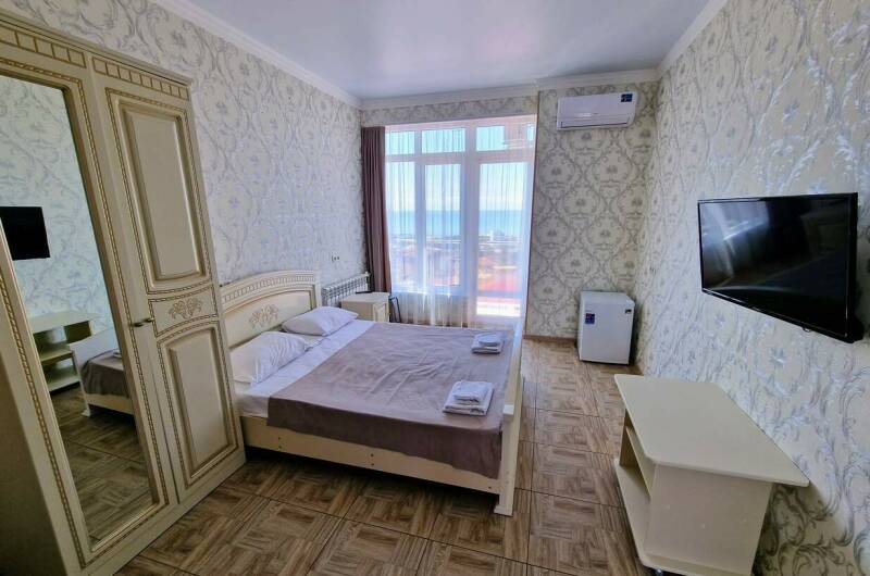 Четырёхместный «Делюкс» с балконом и видом на море