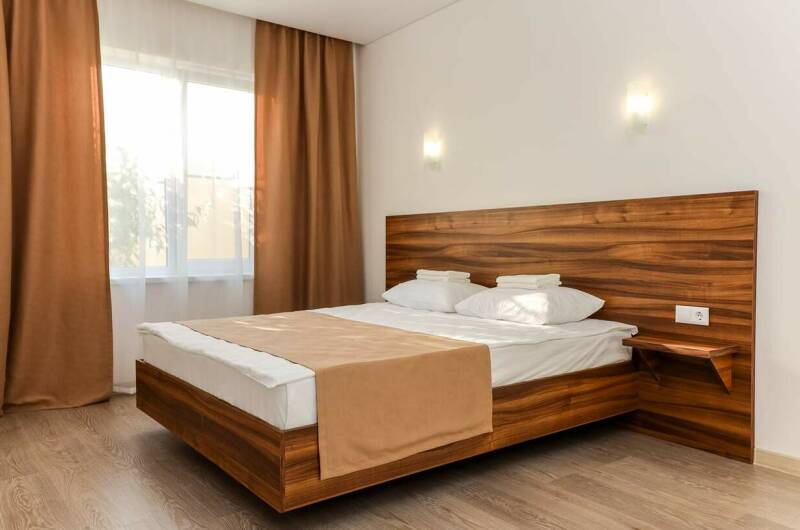 Большой номер с разделенными зонами и кухней