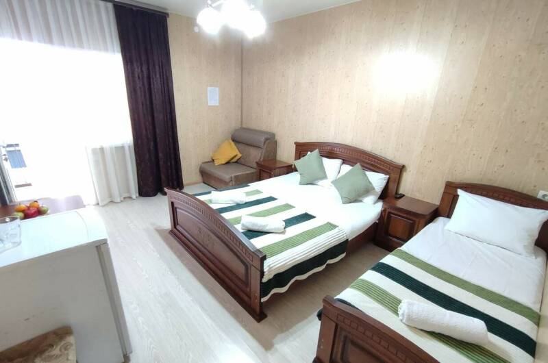 Семейный номер с ванной для 3−4 гостей