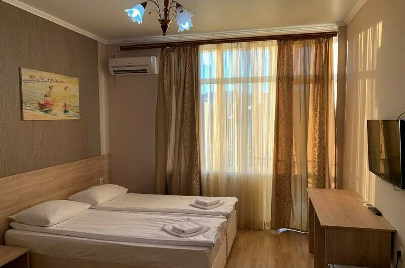 Улучшенный 2−3 местный номер с балконом и видом