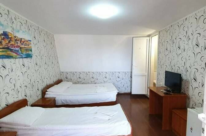 Стандартный 3-х местный номер с общим балконом