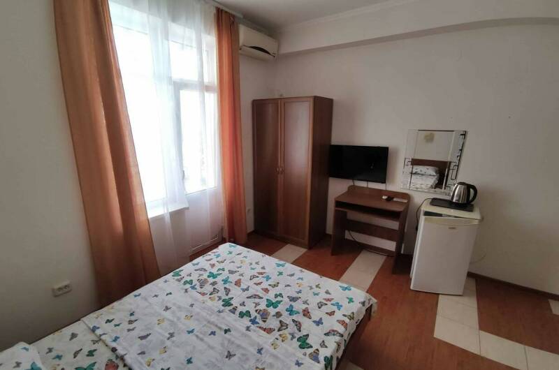 Трёхместный номер с балконом