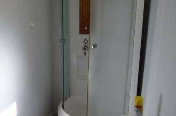 Деревянный домик с террасой