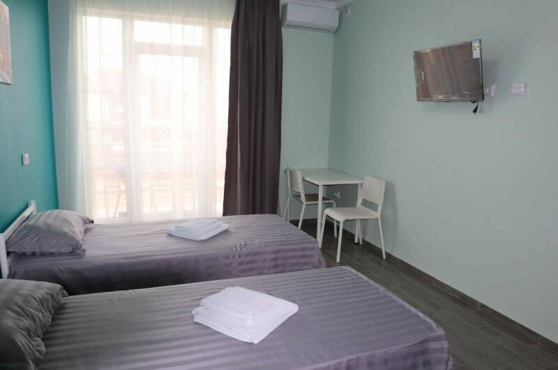 Двухместный с двумя односпальными кроватями