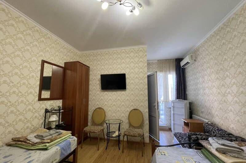 Трехместная комната с балконом