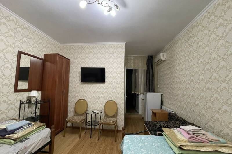 Трехместная комната с балконом