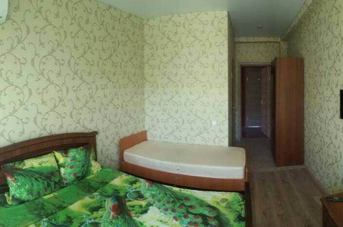 Трехместный номер с балконом