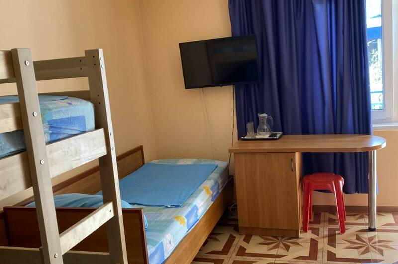 Номер стандарт с двухъярусной кроватью