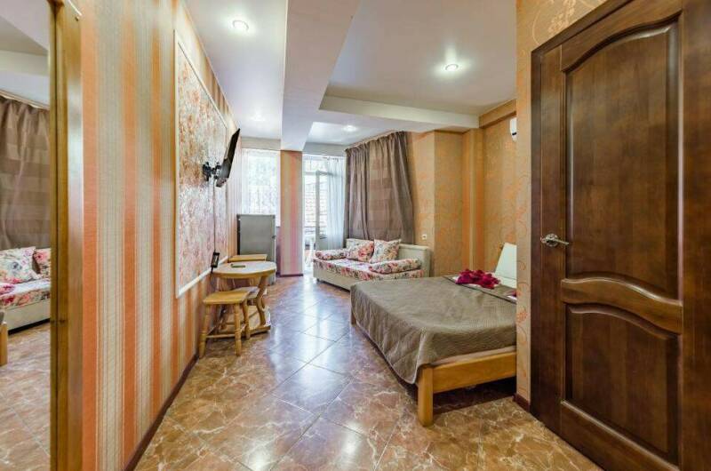 Трехместный номер с балконом