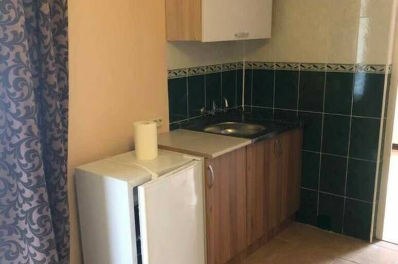 Двухкомнатный номер с кухонной зоной