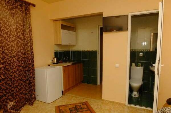 Двухкомнатный номер с кухонной зоной