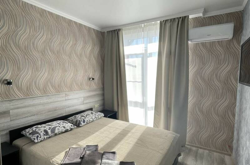 Двухкомнатный номер с обеденной зоной на третьем