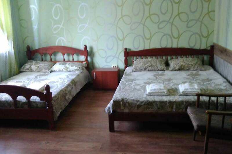 Комната семейная для 4 человек с двумя кроватями