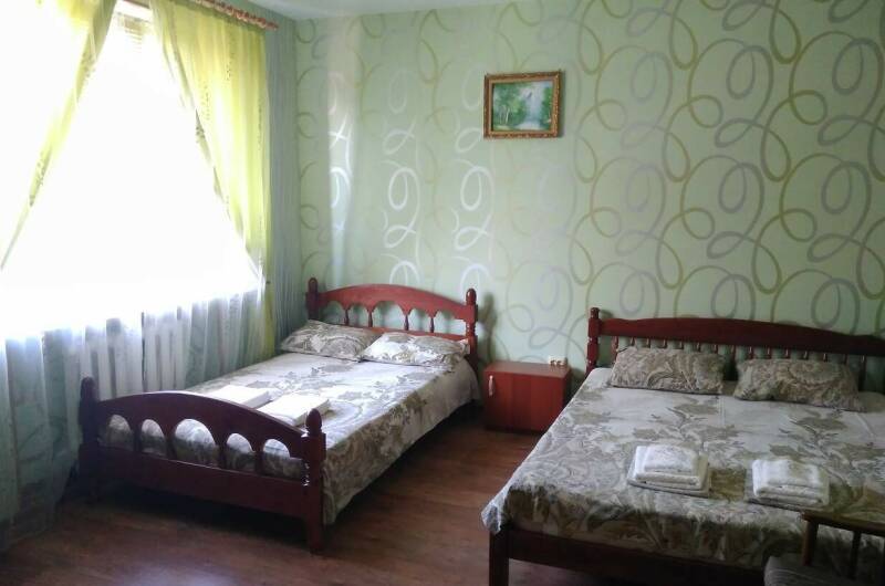 Комната семейная для 4 человек с двумя кроватями