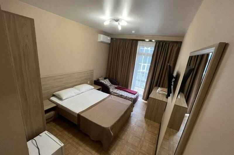 Трехместный номер с балконом