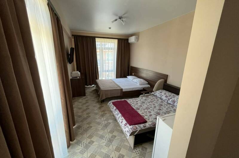 Четырехместный номер с балконом