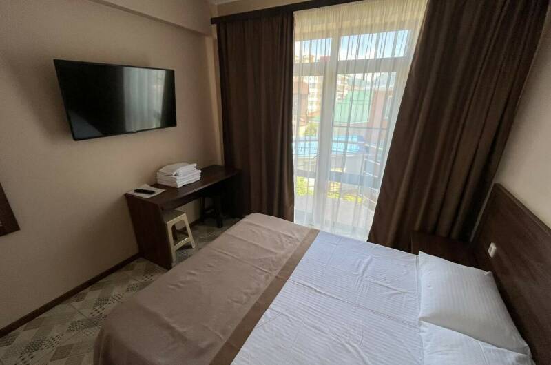 Четырехместный номер с балконом