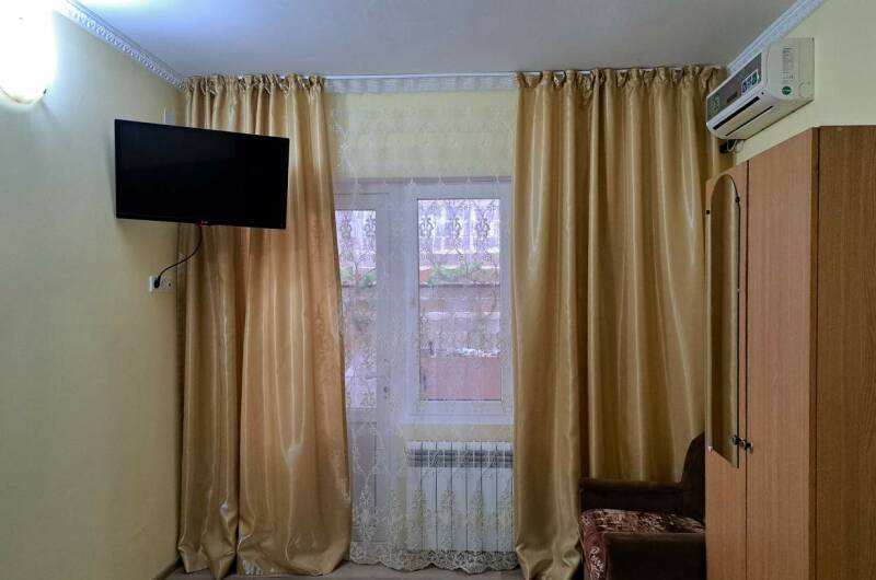 Стандартный трехместный номер с балконом