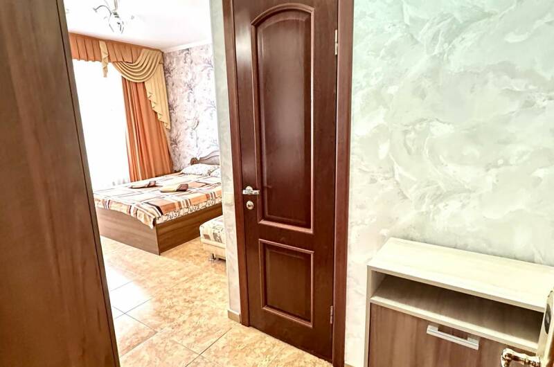 Трехместная комната с балконом