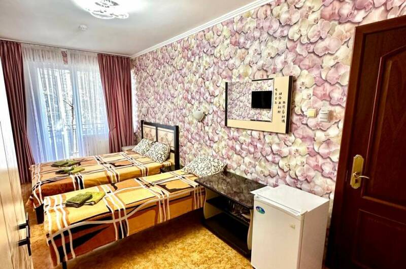 Трехместная комната с балконом
