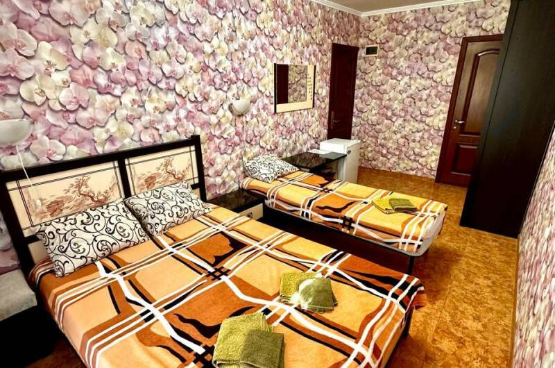 Трехместная комната с балконом